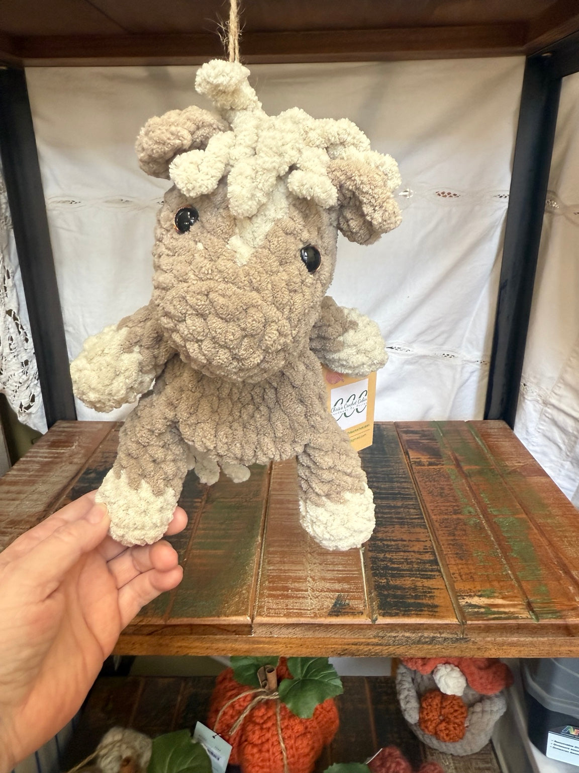 Bitty Pony Snuggler handmade crochet pony display view